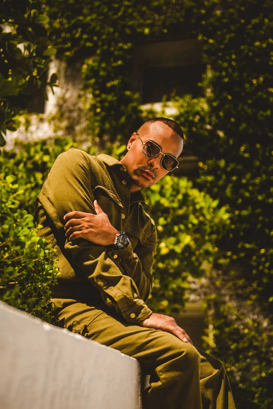 Outdoor Miami portrait of a man in an olive jacket